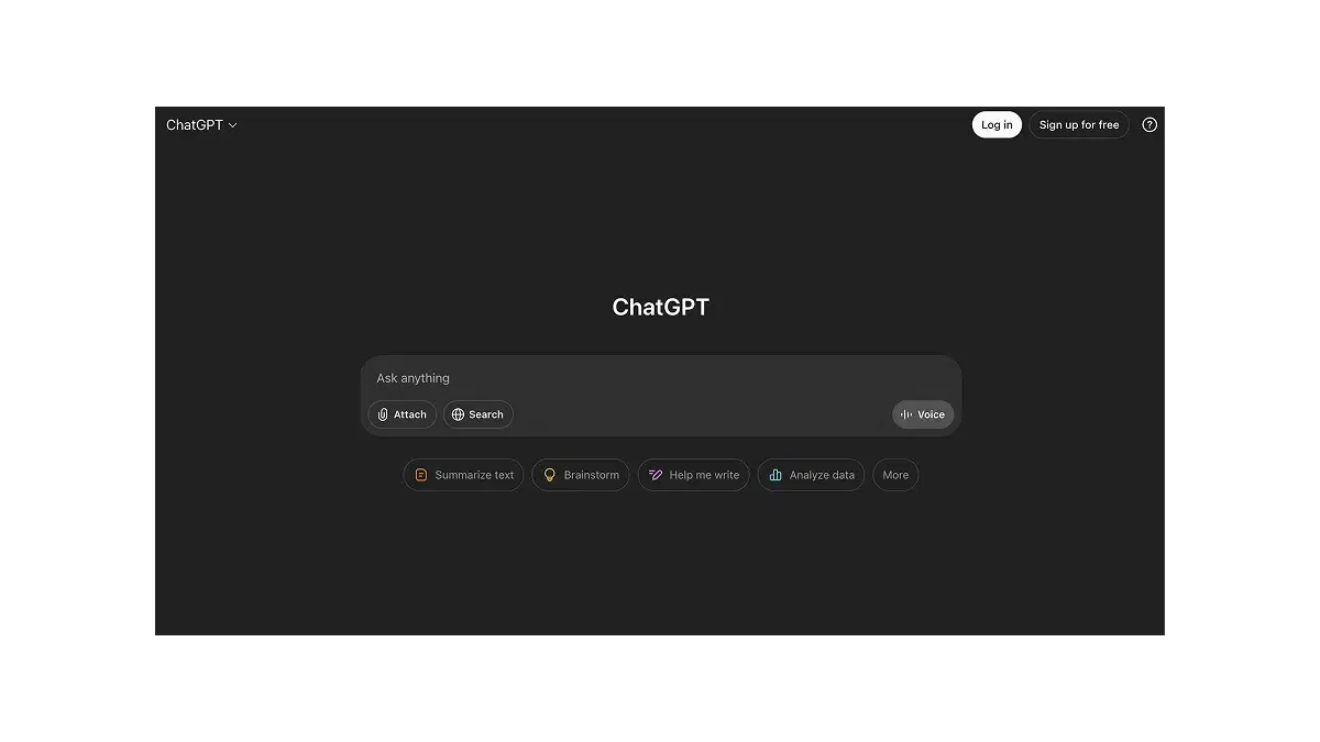 Screenshot of the ChatGPT home screen in dark mode, showing the prompt input bar with options like Attach, Search, and Voice, along with task suggestions like “Summarize text” and “Analyze data.”